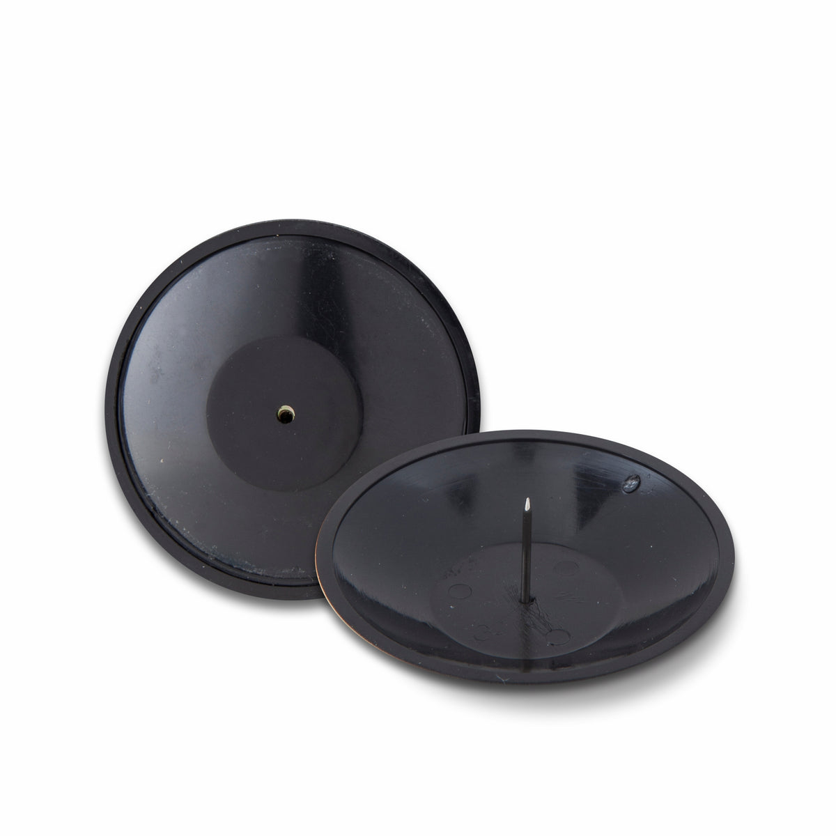 A black RF 8.2MHz clam tag with a round design and a central pin, displayed in an open position to show the other side.